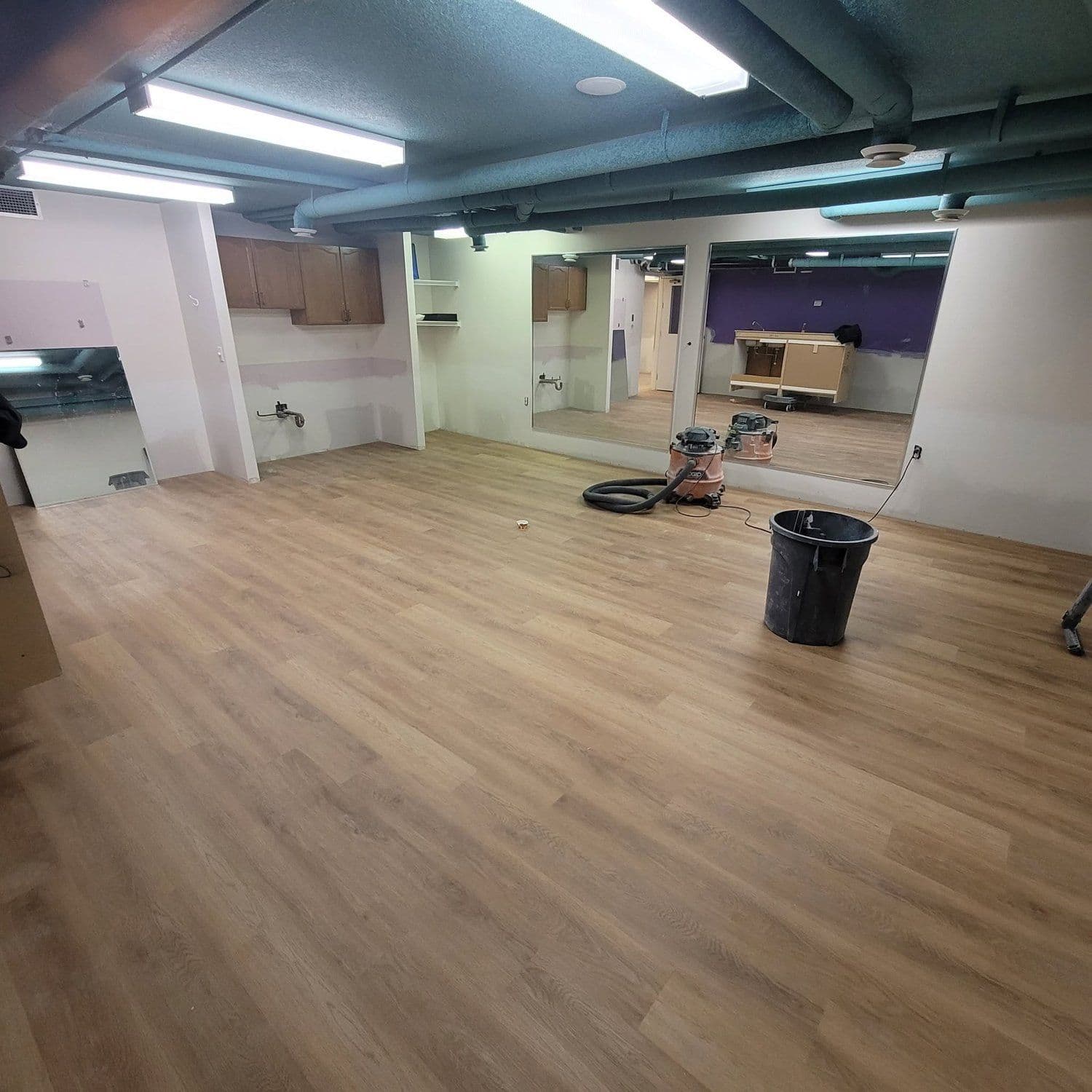 Commercial interior unit with new vinyl plank flooring installed